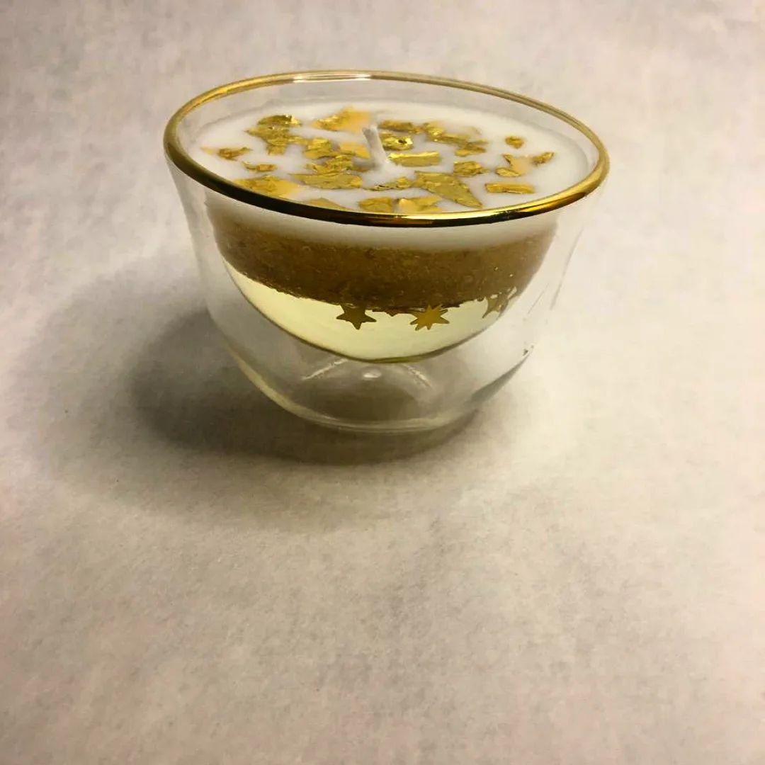 الذهب المتلألئ" الشمعة العائمة _جل و صويا "